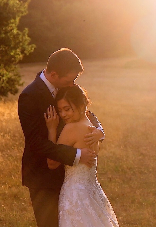 Wedding couple hugging at Botleys Mansion