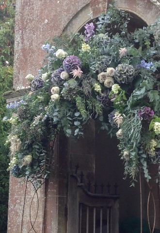 The Velvet Daisy Wedding Flowers in London Devon Cornwall Flower Arch Church Flowers 