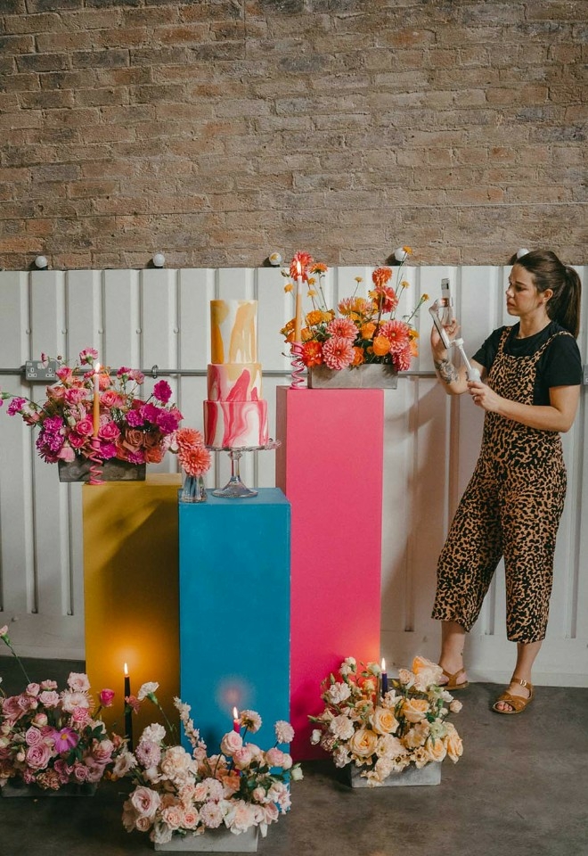 A wedding content creator based in hampshire holding a gimbal and a smartphone