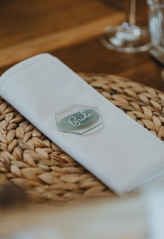Sea grass mats and beaded charger plates elevate your table