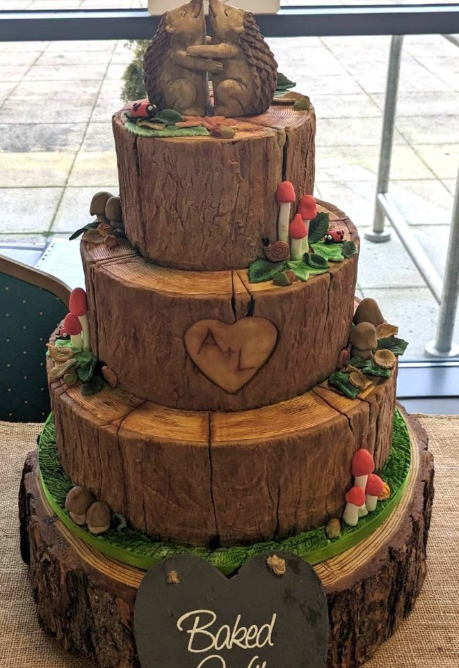 Tiered wedding log style wedding cake with hedghogs for wedding at the Sheepshed South Wales by Gails Cake Pantry Powys