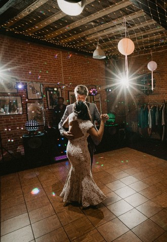 Bride and groom share their first dance at Cherwell Boathouse, Oxfordshire