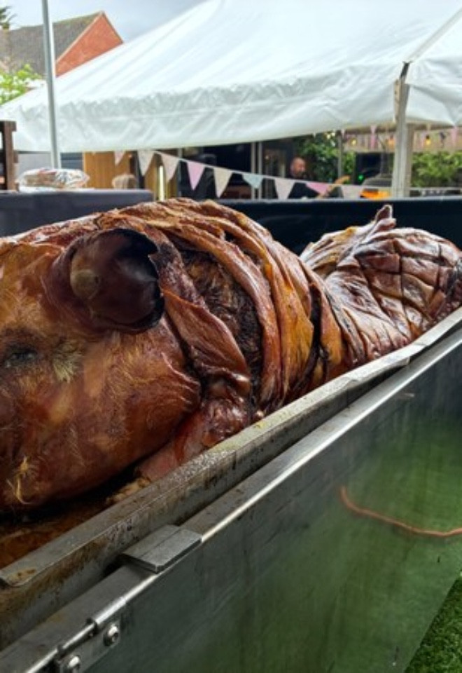 Whole roasted hog ready to be served at a Lancashire wedding