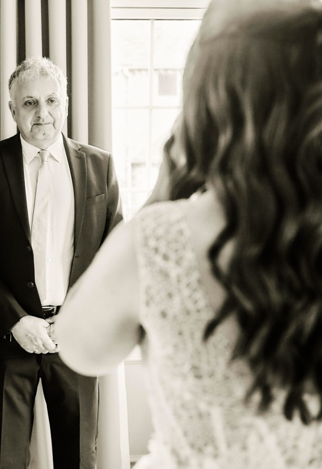 Father sees bride daughter for first time at Four Seasons Hampshire wedding by Stuart Wood