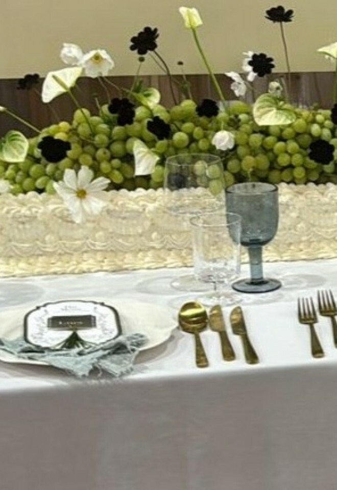 Long table Lambeth cake decorated with grapes and flowers