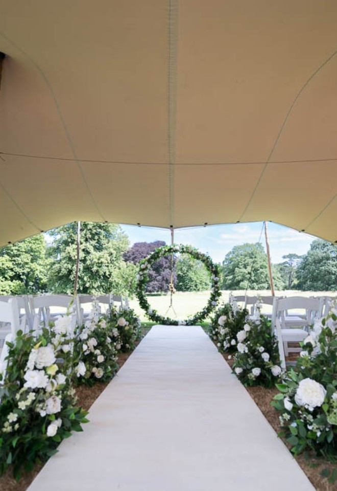Outdoor ceremony, décor supplied by Holly Boo  