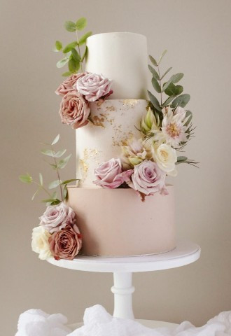 Three tier dusky pink wedding cake designed by Wren Cake Design