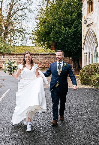 Bride and groom going for a walk around Bisham Abbey, Berkshire
