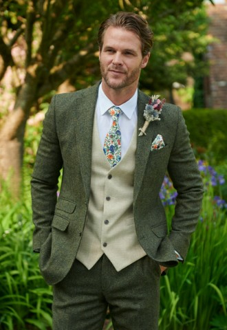 Grooms green tweed wedding suit