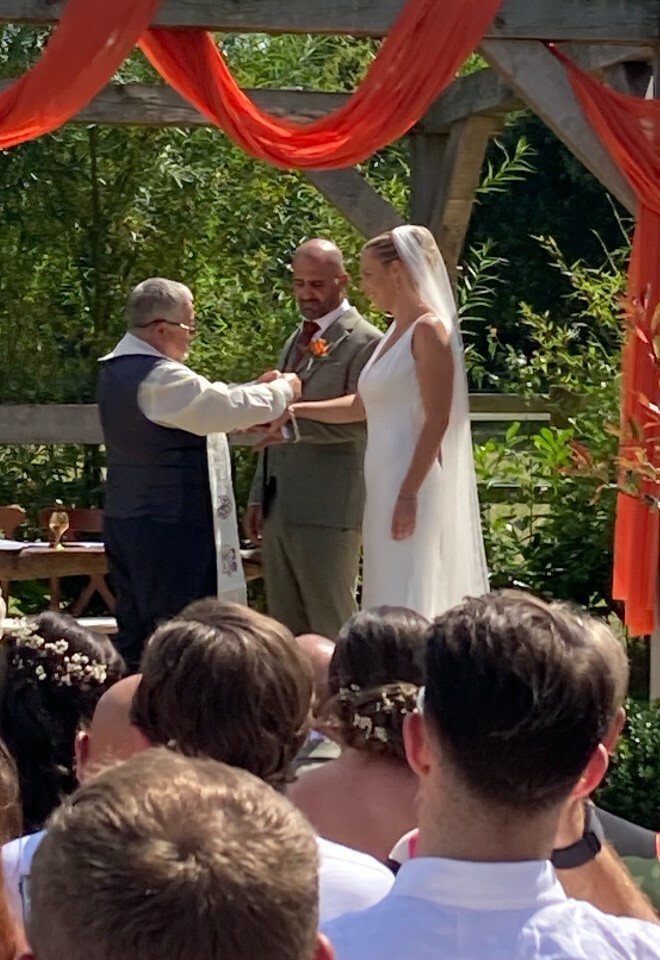 Summer outdoor wedding ceremony by Trevor English