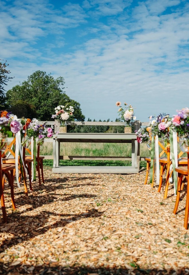 Outdoor wedding ceremony at The Barn at The Bottle and Glass Inn