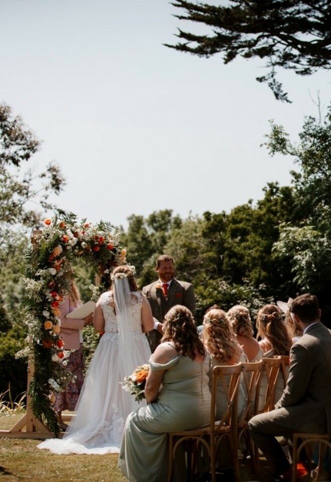 couple being wed at the alter at The Rosevine 