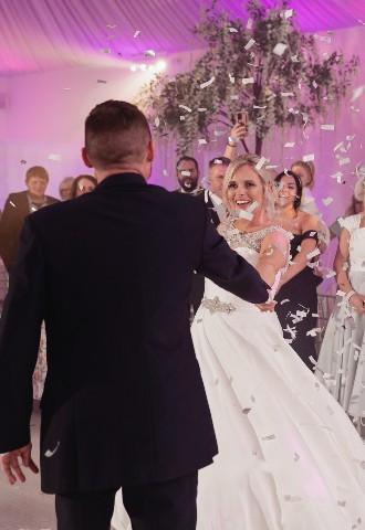 Bride and groom share their first dance at Henblas Country House, Anglesey, North Wales