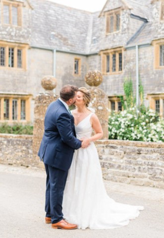Midelney Manor bride & groom kiss