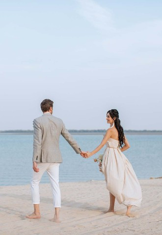 Bride and Groom on beach at Vida UAQ
