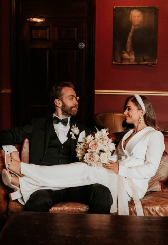 Wedding couple in the lounge at Melville Castle - a castle wedding venue near Edinburgh