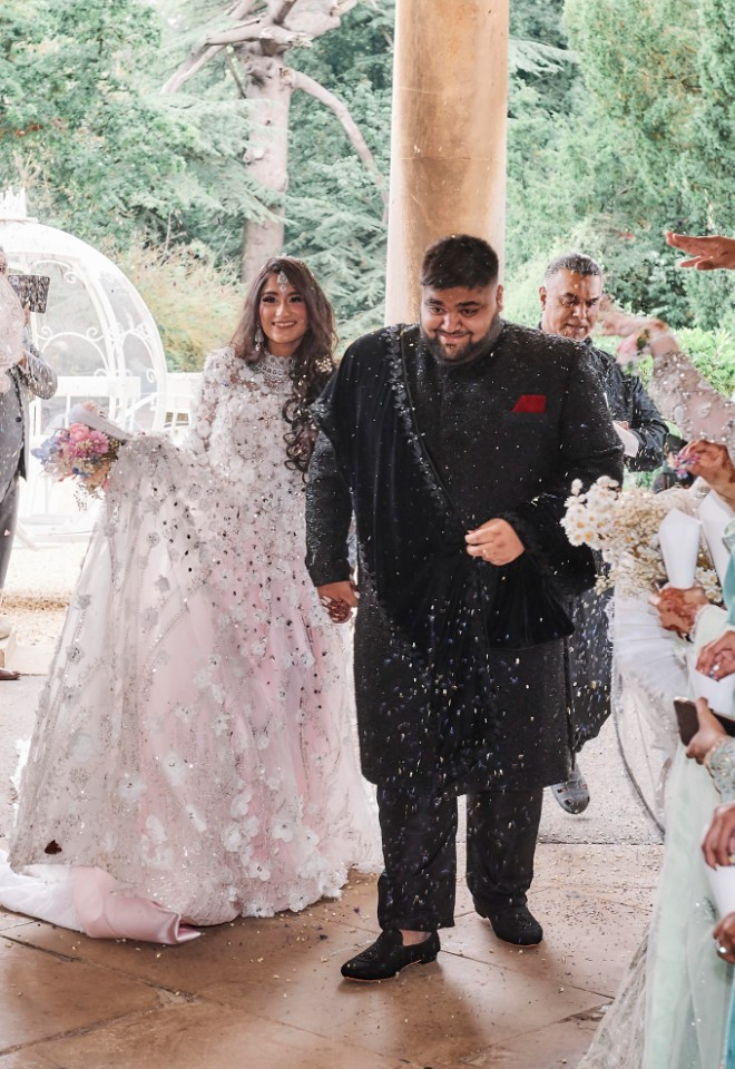 Asian wedding at Prestwold Hall wedding confetti picture by Stuart Wood