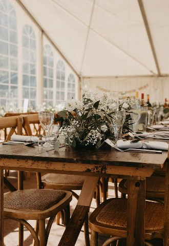 Flowers on table at The Stable Wedding Farm in Manchester