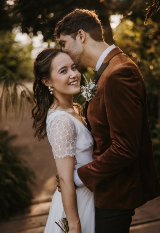 Wedding couple on bridge in Eden Project