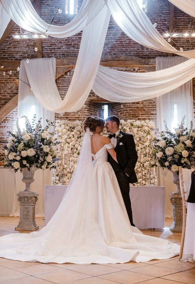 Ballgown, Bridgeton vibe flowers, flower wall, drapery, 17th C barn