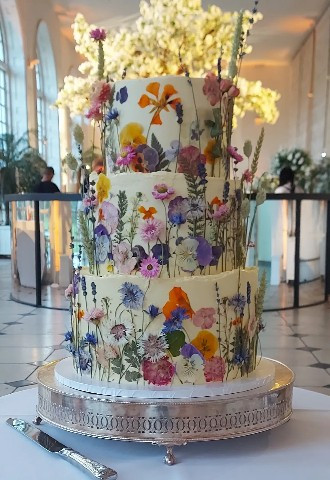 Rustic Buttercream Wedding Cake with Vibrant Pressed Edible Flowers