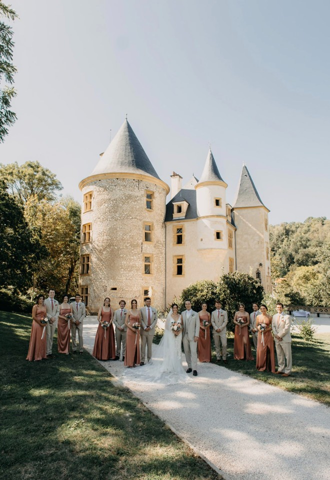 bridal party stood outside Chateau de Saint Martory, french wedding