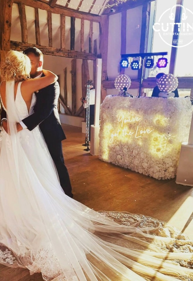 EASTON GRANGE WEDDING DJ WITH FLORAL STAND AND YOUVE GOT THE LOVE SIGN