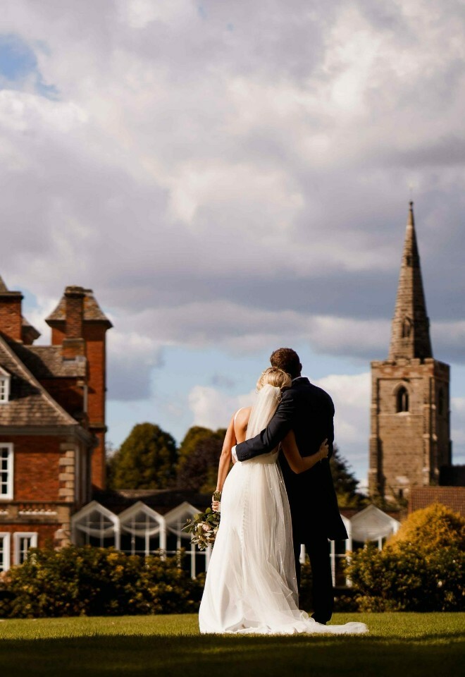 Bride and groom in gardens