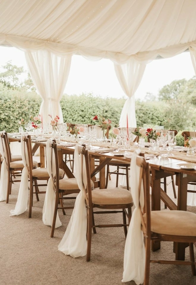 Wedding breakfast set-up in the marquee