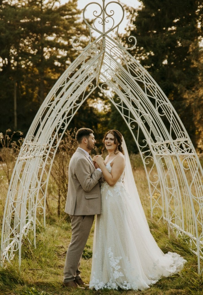 Couple with the bird cage structure