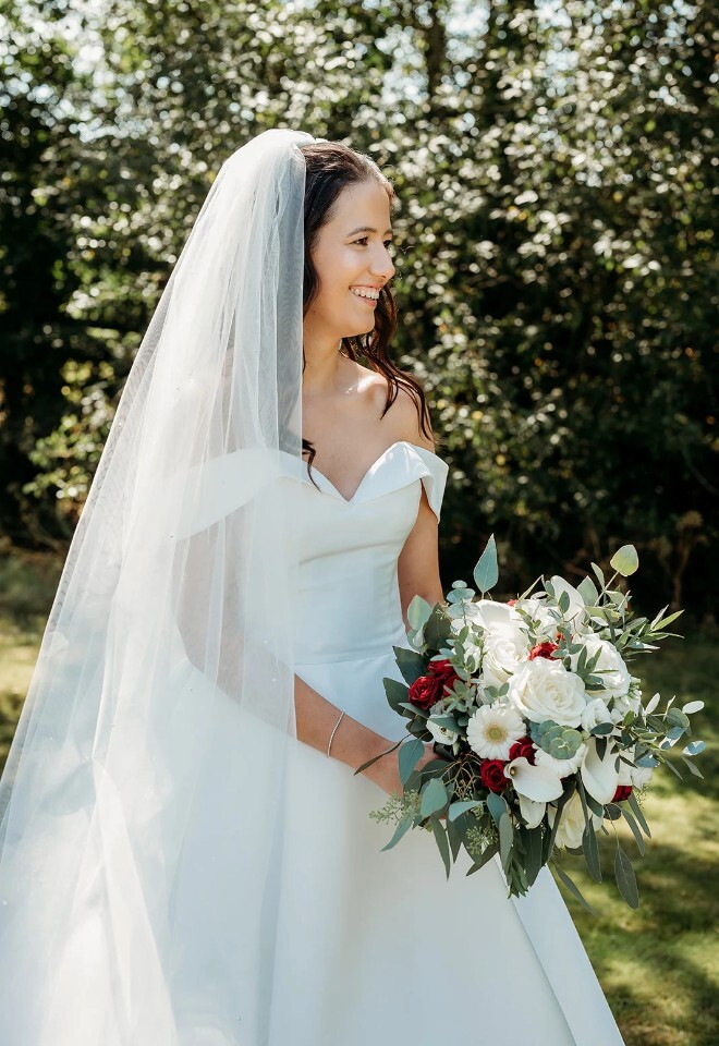 White, red and sage green bridal bouquet from willow & bloom, berkshire florist