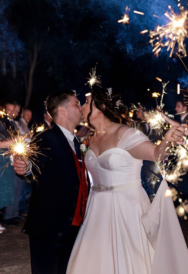 Sparklers with burnt orange wedding theme burnham beeches wedding venue and hotel