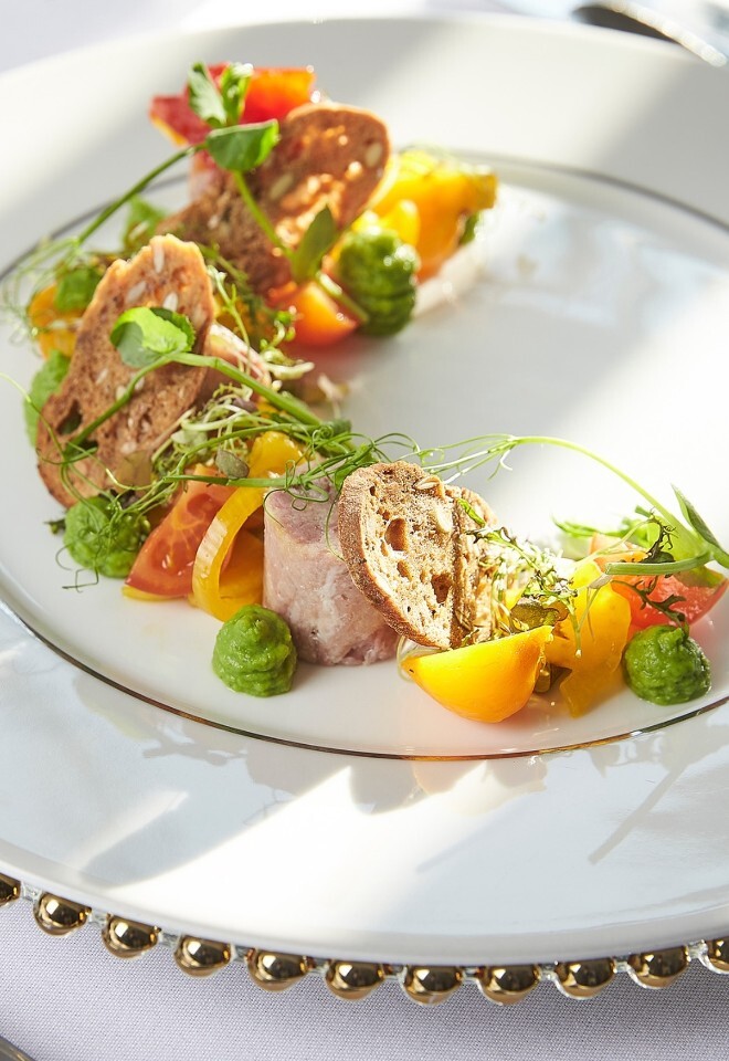 Plated wedding starter with seasonal vegetables and herbs by Portfolio Events Catering, wedding caterers based in Northamptonshire