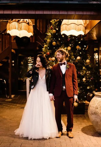 bride and groom at the crazy bear stadhampton decorated for christmas