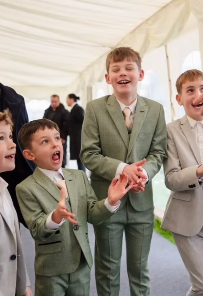 performing magic for the children at a wedding