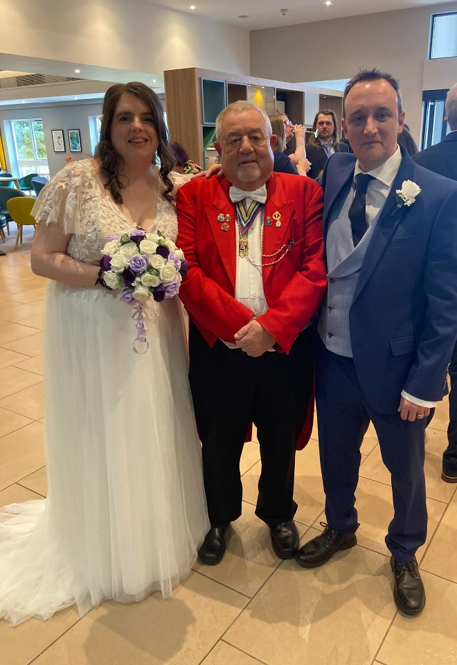 Trevor English toastmaster Holiday Inn Fareham stood with the bride & groom