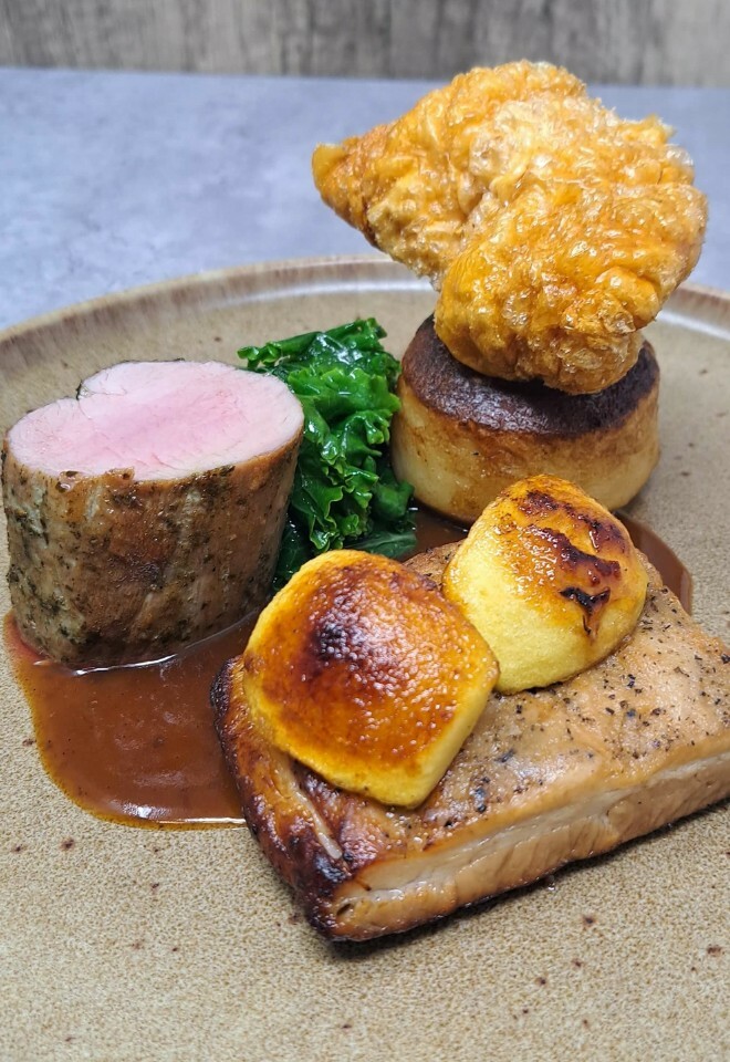 Slow roast pork belly, herb roasted pork fillet,  fondant, kale, caramelized apple