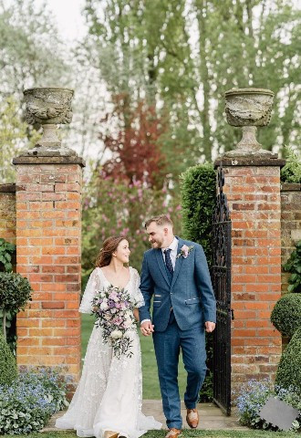 Bride and groom exploring the grounds at Colshaw Hall, Cheshire
