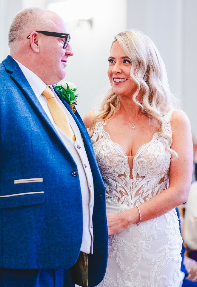 bride and groom exchanging vows