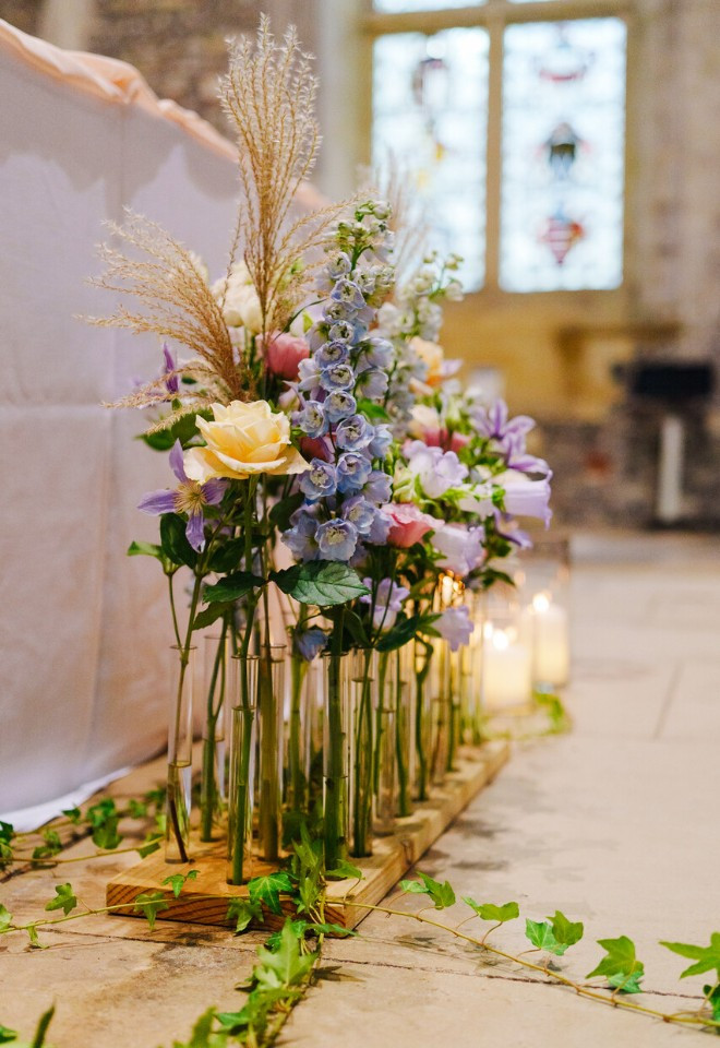 Pastel themed wedding flower decorations at The Great Hall in Winchester