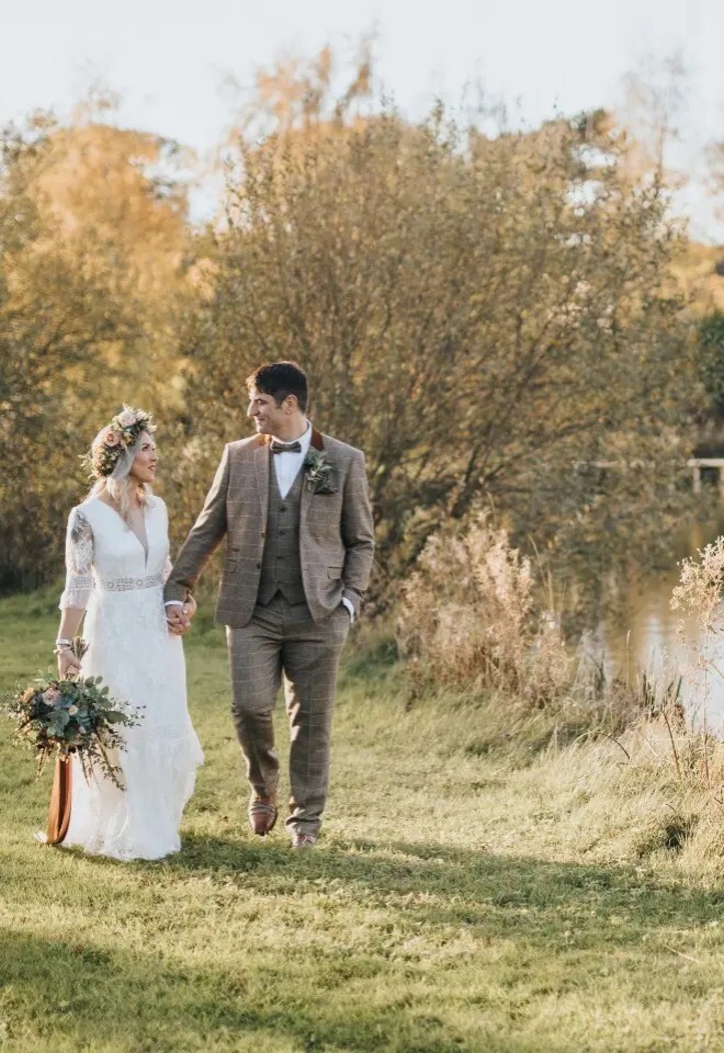 Married Couple beside the lake at Hall Farm Hotel, Ashby cum Fenby