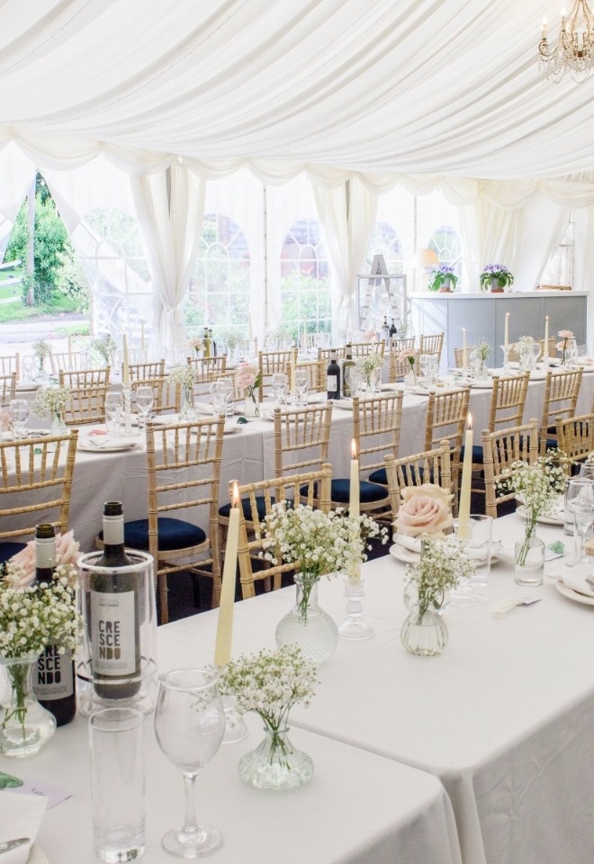 Wedding breakfast set up in the marquee at Monkton Barn wedding venue Buckinghamshire