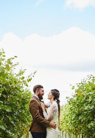 Wedding couple photo in vineyards at Copdock Hall Suffolk