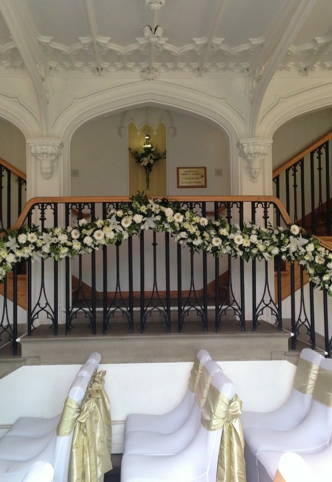 chair covers, sashes & floral decorations for missenden abbey weddings from hire heaven