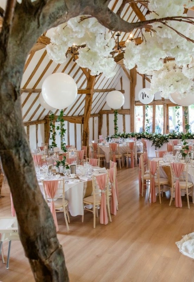 Blossom tree overlooking wedding breakfast tables