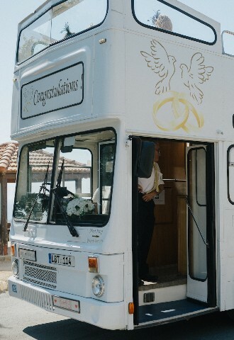 white double decker bus for guest transport in cyprus