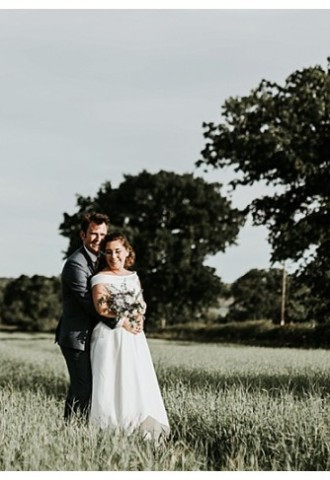 Bride and groom pose for wedding photography at The Secret Garden, Vale of Glamorgan