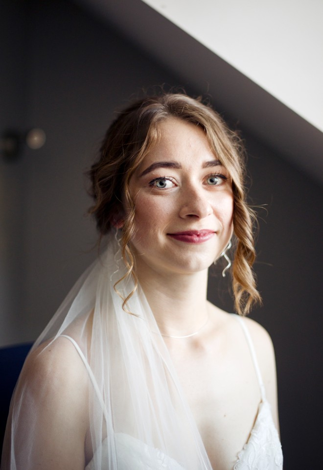 A gorgeous bride after seeing herself in her bridal look for the first time and taking a breather before walking down the aisle