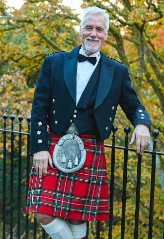 Highland wear, red tartan. Harrogate Suit Hire - Cameron Ross