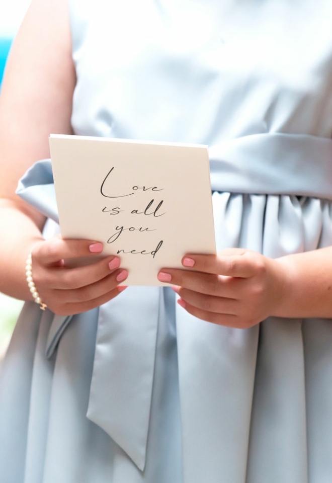 Bridesmaid reading at wedding 
